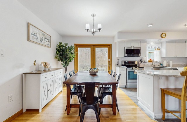 Dog-friendly home with A/C, W/D, games, deck, yard, & a private hot tub