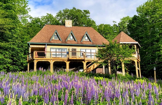 Dog-friendly, lake-view chalet with gazebo, wraparound deck, grill, & fireplace