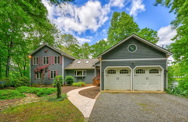 Dog-friendly lakefront home with dock, pool table, fireplace, grill, two kayaks