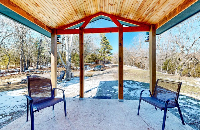 Dog-friendly log home near downtown with firepit, gas grill, & decks