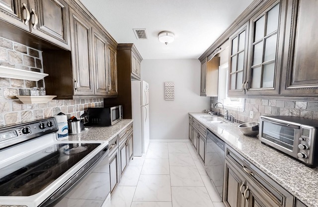 Dog-friendly retreat with a private saltwater pool, inviting patio & W/D