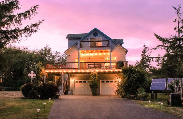Dog-friendly riverfront retreat with hot tub on 5.2 acres near the beach