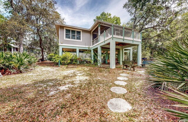 Dog-friendly, riverfront home with screened porch, firepit, & private dock
