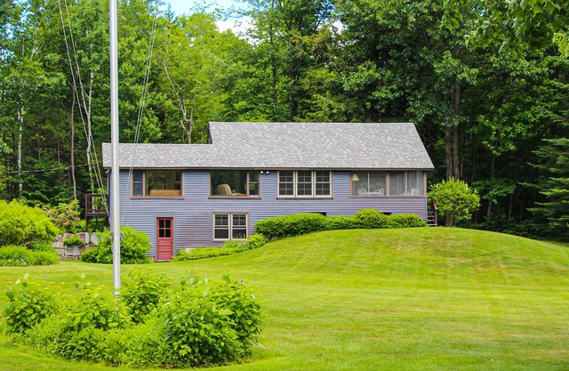 Dog-friendly waterfront cottage with private dock, community beach, grill, W/D