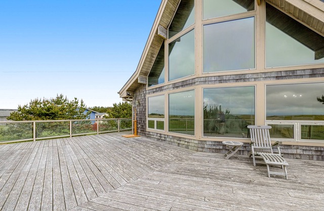 Dog-friendly, waterfront getaway w/ a fireplace, furnished deck, & enclosed yard
