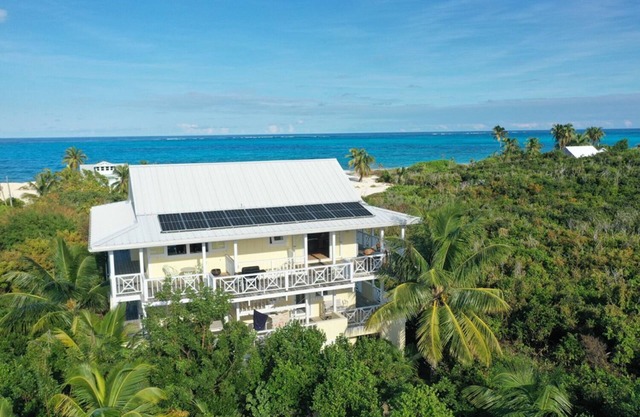 Don't worry. BEACH HAPPY! Man-O-War Cay. Your best-ever family beach vacation.