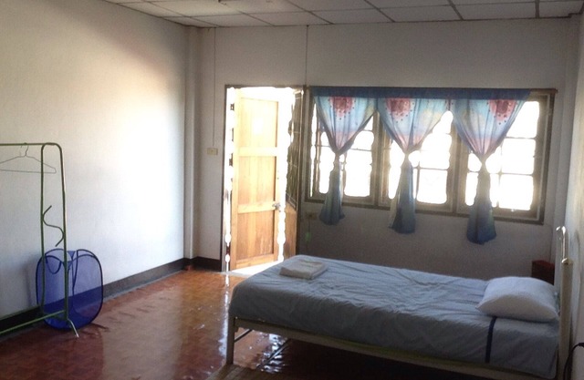 Dormitory room with two twin beds on private floor