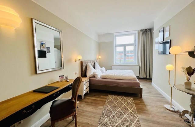 Double room mezzanine with harbor view - Gästehaus Lexow