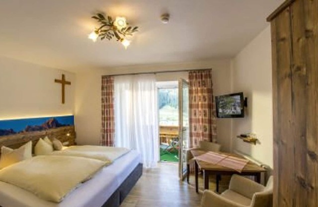 Double room with balcony 2 - Apartments and Pension Mariandl
