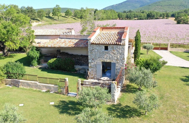 Dovecote in stones in the middle of the lavenders