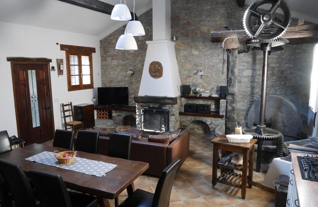 Dreamlike old oil mill in a romantic location right on the river