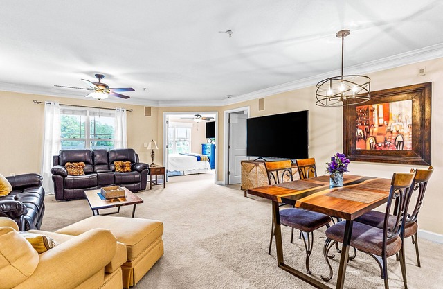 Dreamy lakefront escape on 18th fairway with pools, tennis, & elevator