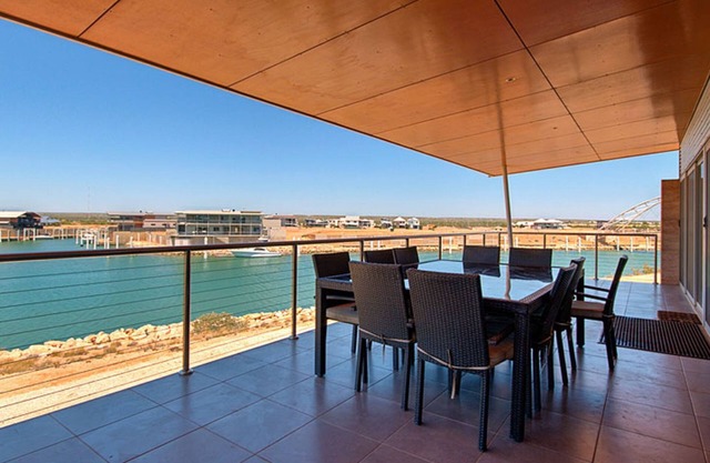 Dunes - Luxury two story home on the canals. Free access to swimming pool at Mantarays Resort