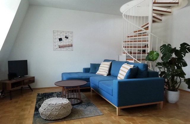 Duplex apartment over 2 levels with roof terrace in Dresden-Blasewitz.