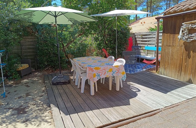 Duplex house with pleasant, sunny garden with trees: "just like home".