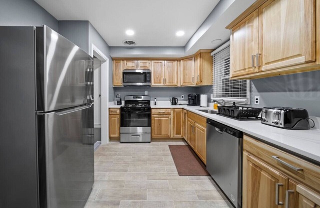 Elegant Oasis: 4-Bedroom Home Away from Home