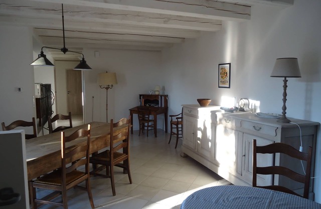 Elegant Provencal house surrounded by vineyards and olive groves.