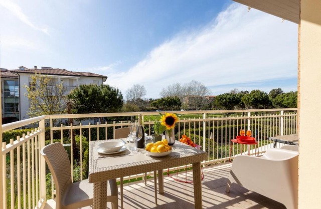 Elegant Seaside Apartment with Pool and Parking