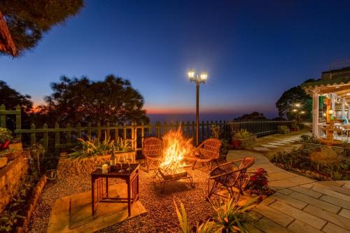 ELIVAAS 3BHK Plus Attic Cliffside Villa with Scenic Views