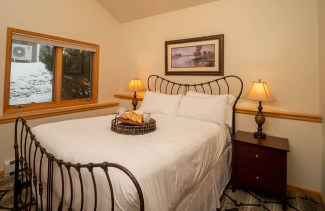 Enchanting condo with fireplace, patio, and private hot tub!