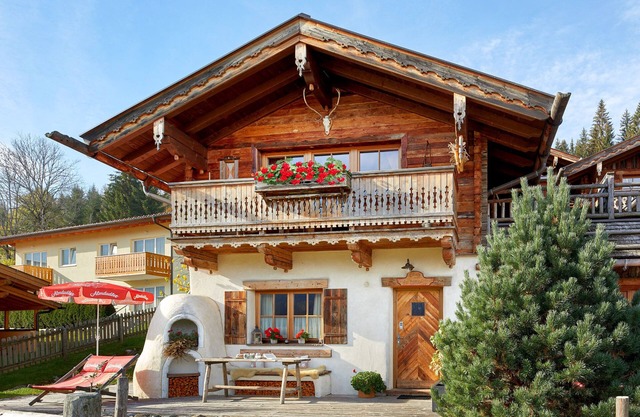 Enchanting hut in Almdorf Flachau with fireplace, private sauna and alpine charm
