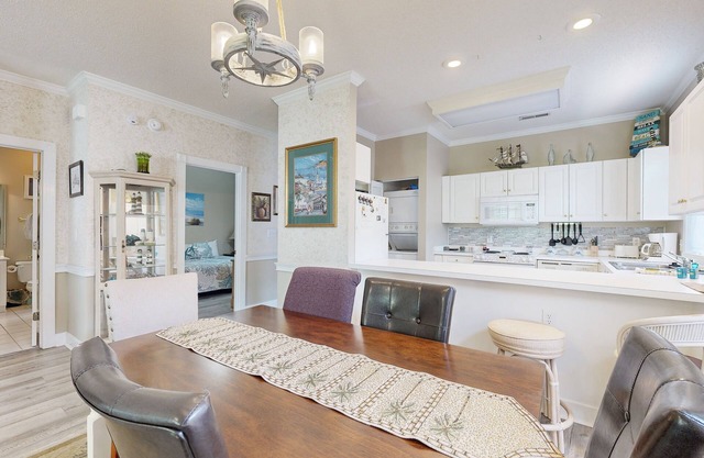 End-unit condo with covered patio, pool, tennis & washer/dryer - dog-friendly