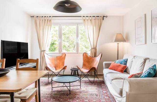 Enjoy a peaceful escape from the hustle and bustle of the city center in this thoughtfully designed apartment.