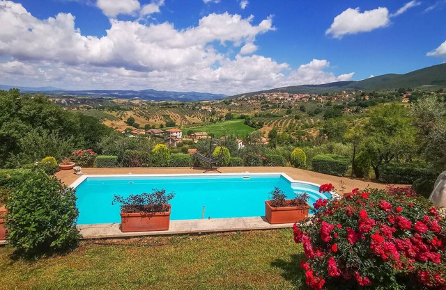 Enjoy the fantastic view in this inviting vacation home with pool.