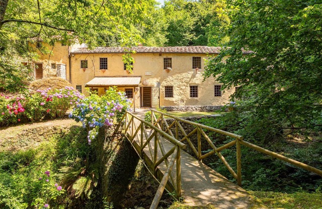 Enjoy your stay in Tuscany in this 15th century mill converted into a vacation home.
