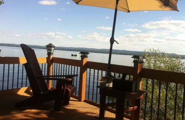 Entire four bedroom home with private beach and Lake Access