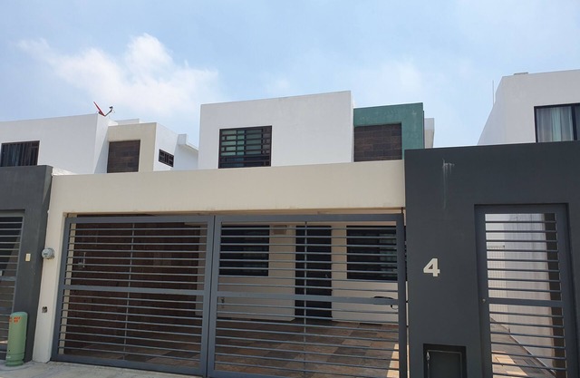 Entire house furnished 3 bedrooms 3 bathrooms security heated parking.
