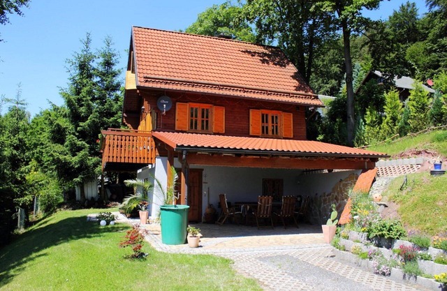 Entire vacation home with sauna, fireplace, parking, balcony and garden with fireplace
