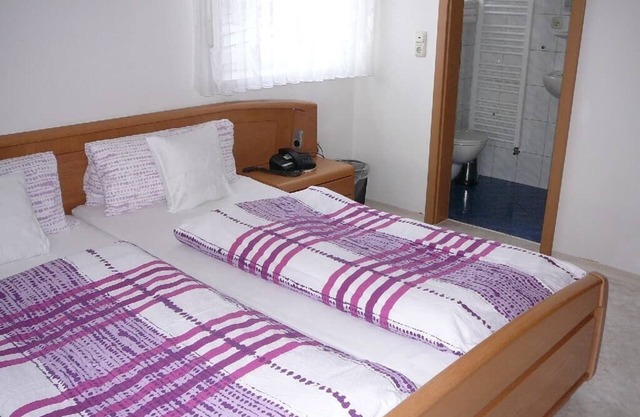 Erdgeschoss-Ferienwohnung mit Balkon