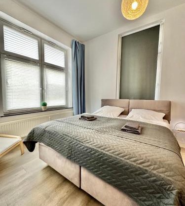 Erholsame City-Erdgeschosswohnung mit Veranda, Grill und Parkplatz D46EG