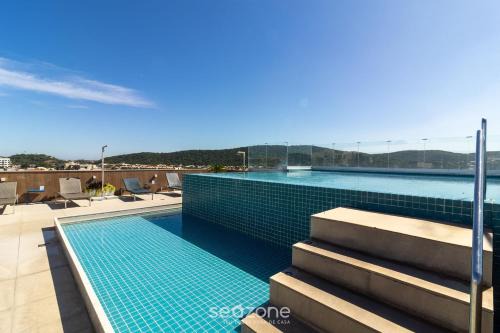 Estadia com piscina e sauna a poucos passos da praia em Cabo Frio - HSC