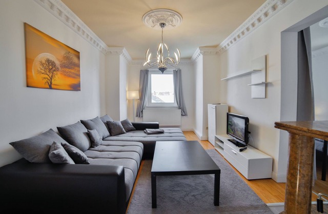 Exclusive apartment in historic residential building with fireplace, bathroom & plenty of space