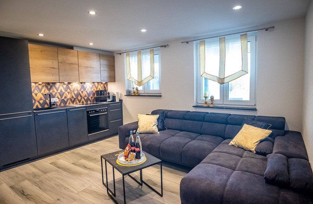 Exclusive family suite in Friedrichshafen with covered terrace and garden