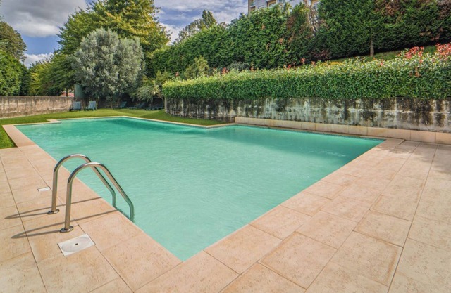 Exclusive flat, family-friendly with private pool, gardens and playground!