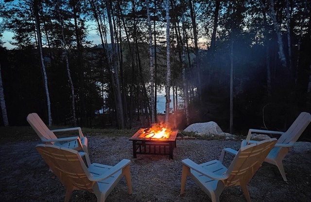 Expansive Lakefront modern retreat nestled by nature, huge windows ,4 bedroom