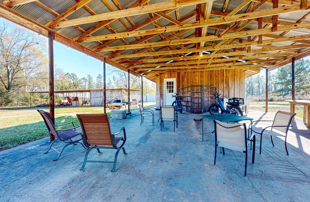 Expansive property with two homes, ponds, pool, game tables, & hiking trails