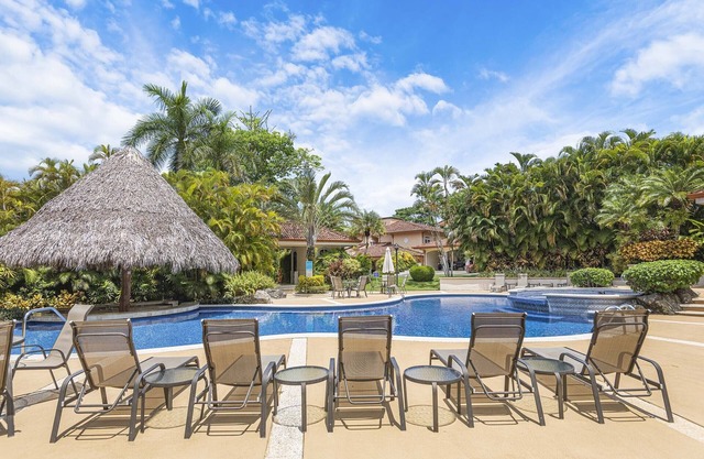 Experience a contemporary luxury condo with pool, gym, and beach club access.