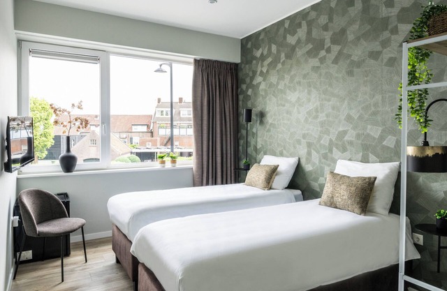 Experience comfort and charm in this beautifully appointed room for two in Raamsdonkveer.