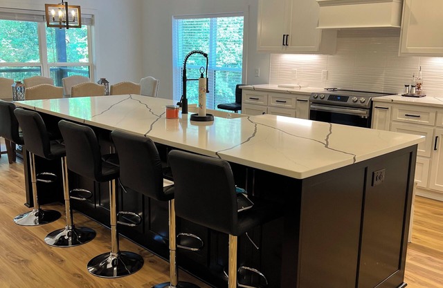 Experience Lake Tuscaloosa views from your 5-bedroom Northport retreat