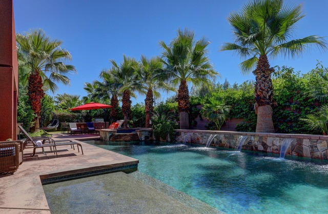 Experience luxury at Paramount, featuring stunning mountain views, a large pool and game room!