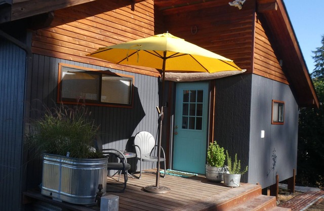 Experience the PNW in a cabin on Hood Canal with water and mountain views.