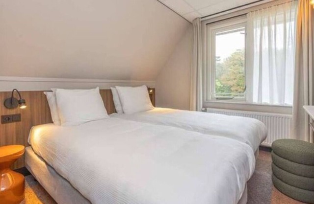 Explore Veluwe from Cozy Lodge: Bike Rentals, Free Parking, Breakfast
