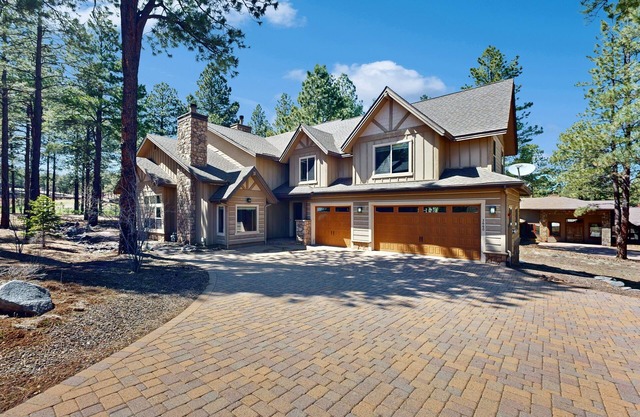 Exquisite home with mountain views, fireplaces, & game room