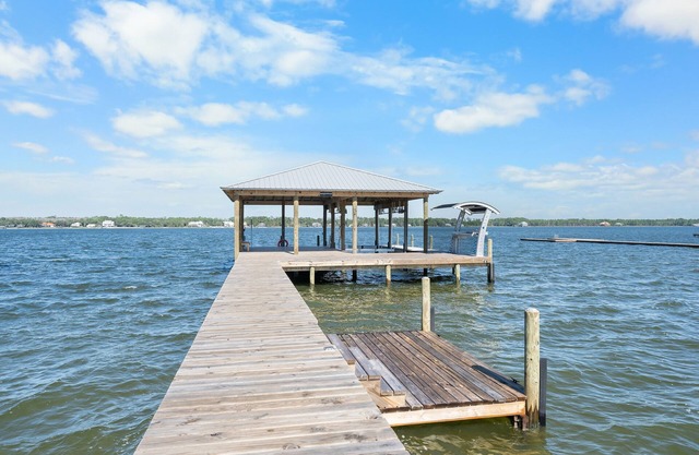 Exquisite lagoon front home with private pool, pier and boat lift