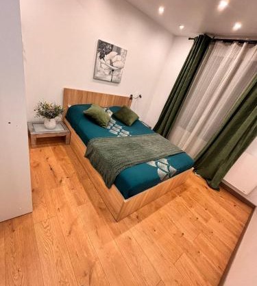 F2 cosy et calme 15 min de Paris, commerces à pied