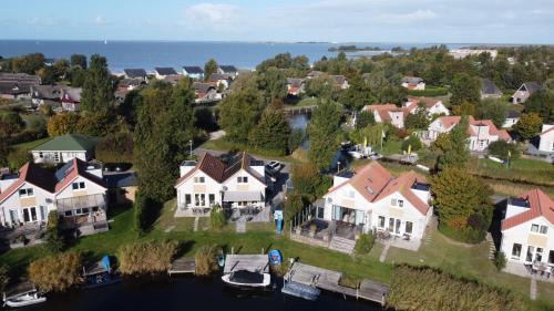 familienfreundliches Ferienhaus mit Ruderboot, Sauna und Kamin sowie E-Ladestation